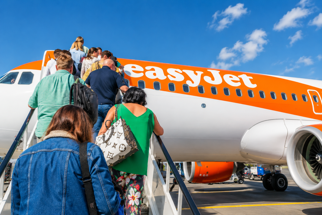 Passengers boarding an easyJet aircraft at the airport